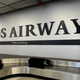 US Airways baggage claim at Chicago’s O’Hare Airport Aug. 13, 2013
MIRA OBERMAN/AFP/Getty Images